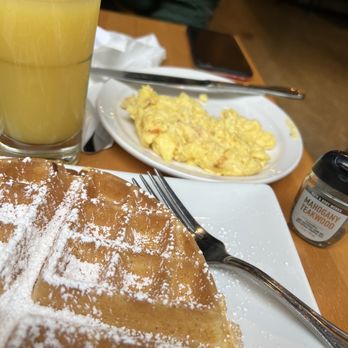Dime Store - Waffle with side of scrambled eggs and mimosa. - Breakfast & Brunch Near Me - Detroit, Michigan Dime Store - Waffle with side of scrambled eggs and mimosa. - Breakfast & Brunch Near Me - Detroit, Michigan
