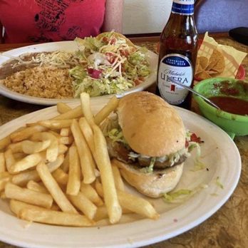 Los Manjares De Pepe - Carne asada torta and fries on one plate and beef folded tacos, rice and beans on the other. - Mexican Near Me - Yuma, Arizona Los Manjares De Pepe - Carne asada torta and fries on one plate and beef folded tacos, rice and beans on the other. - Mexican Near Me - Yuma, Arizona