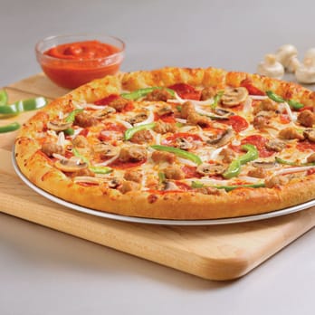 Domino's Pizza - a pizza on a cutting board - Pizza Near Me - Mount Pearl, Newfoundland and Labrador Domino's Pizza - a pizza on a cutting board - Pizza Near Me - Mount Pearl, Newfoundland and Labrador