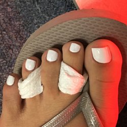 Tulip Nail & Spa - I didn't ask for slanted nails.. ended up filing the nails myself for square shape and now my nails are shorter then I wanted