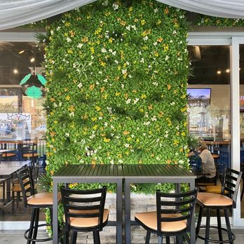 Muse Bar + Bistro - Outside decor - New American Near Me - Clermont, Florida Muse Bar + Bistro - Outside decor - New American Near Me - Clermont, Florida