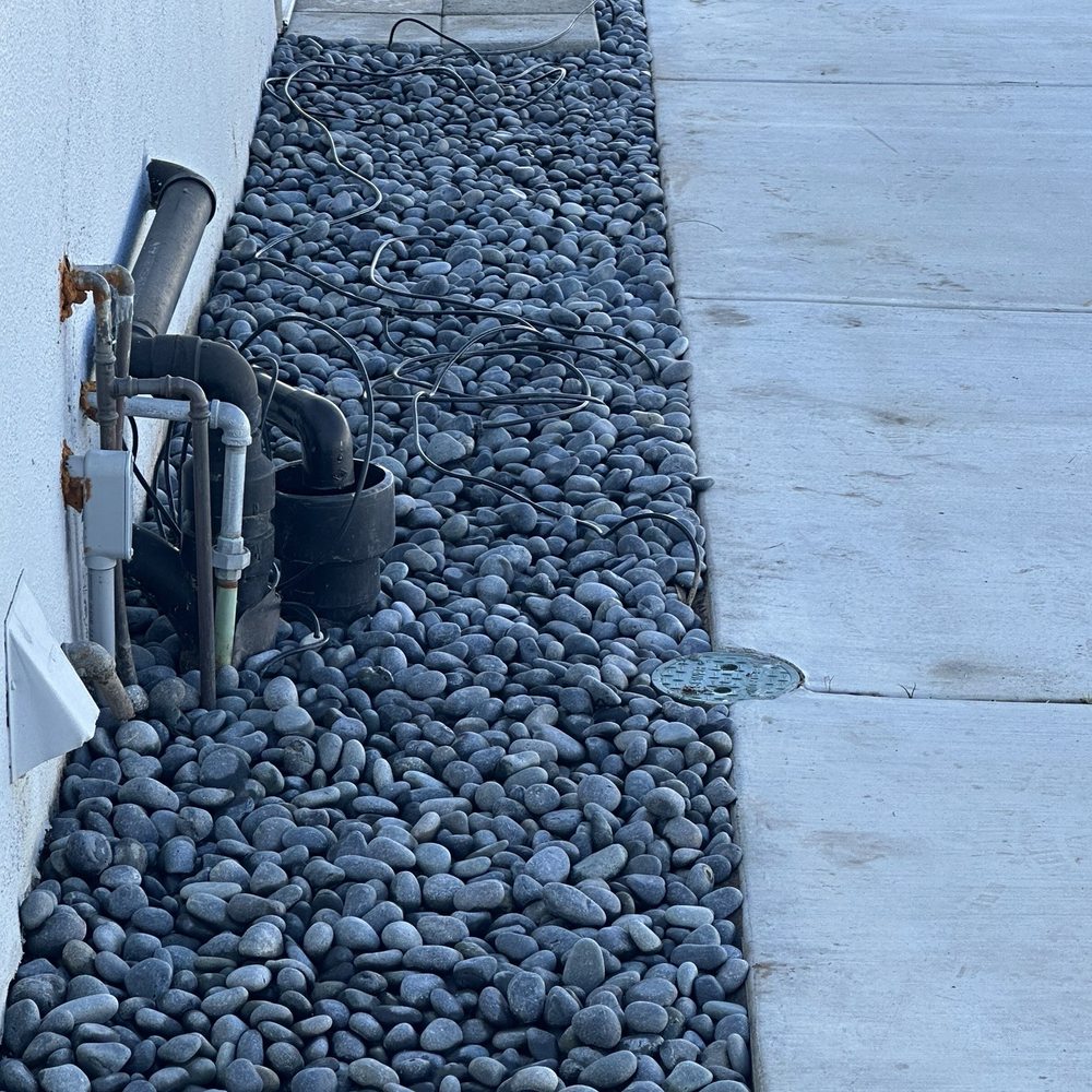 GG'S Green Services - Rock landscaping side area - after - Lawn Services Near Me