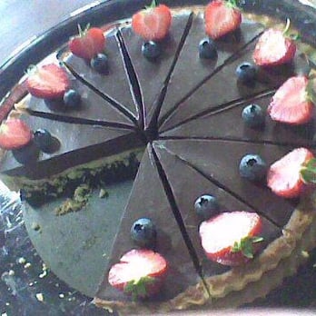 Giro's Cafe - Chocolate Hazelnut Tart at Giros (image courtesy of Giros Cafe FB page). - Vegan Near Me - Belfast, BFS