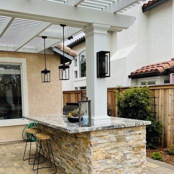 Dream Green Landscape - a patio with a pergol roof - Landscaping Near Me - Thousand Oaks, California