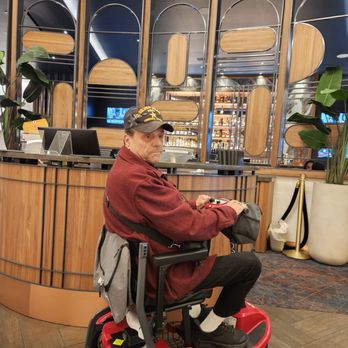 Ramsay's Kitchen - This is my Husband waiting to be greeted & seated on Veterans Day) - New American Near Me - Naperville, Illinois