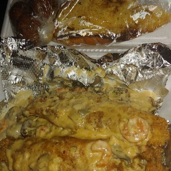 Miss Patty's Wagon - 2 piece catfish over dirty rice with the opelousas sauce with garlic bread. (I added hush puppies) - Food Trucks Near Me - Houston, Texas Miss Patty's Wagon - 2 piece catfish over dirty rice with the opelousas sauce with garlic bread. (I added hush puppies) - Food Trucks Near Me - Houston, Texas