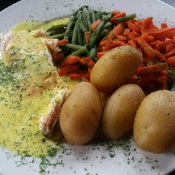 Rod & Reel - Salmon in a fluorescent sauce plus veg and spuds