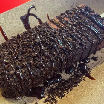 Monarca Gourmet Paletas - Chocolate paleta, dark chocolate dip, Oreo topping, and chocolate drizzle. - Ice Cream & Frozen Yogurt Near Me - Clive, Iowa