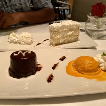 Nan Thai Fine Dining - Coconut Cake $9 Chocolate lava cake with Thai Ice cream $11 - Thai Near Me - Atlanta, Georgia Nan Thai Fine Dining - Coconut Cake $9 Chocolate lava cake with Thai Ice cream $11 - Thai Near Me - Atlanta, Georgia