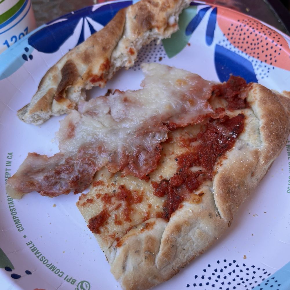 Cold cheese pizza. The cheese was so cold that it came right off with a bite.