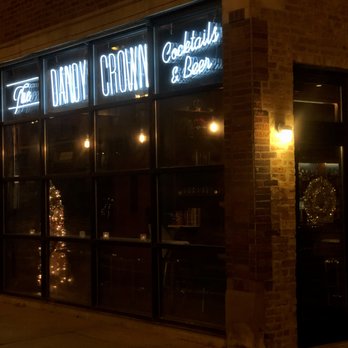 The Dandy Crown - Exterior shot and that white neon really pops. - Cocktail Bars Near Me - Chicago, Illinois The Dandy Crown - Exterior shot and that white neon really pops. - Cocktail Bars Near Me - Chicago, Illinois