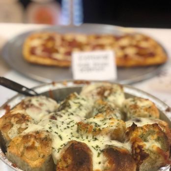Pizza Scene - a pan of pizza and a pan of pizza - Pizza Near Me - Miami Lakes, Florida