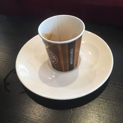 Espresso with no china cup (just plate) or biscotti.