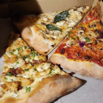 Wiseguy Pizza - two slices of pizza in a box - Pizza Near Me - Arlington, Virginia