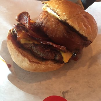 Phil's BBQ - First time here! Winning! BBQ Bacon Cheese Burger with giant onion rings on steroids. Amazing!! - Barbeque Near Me - San Diego, California