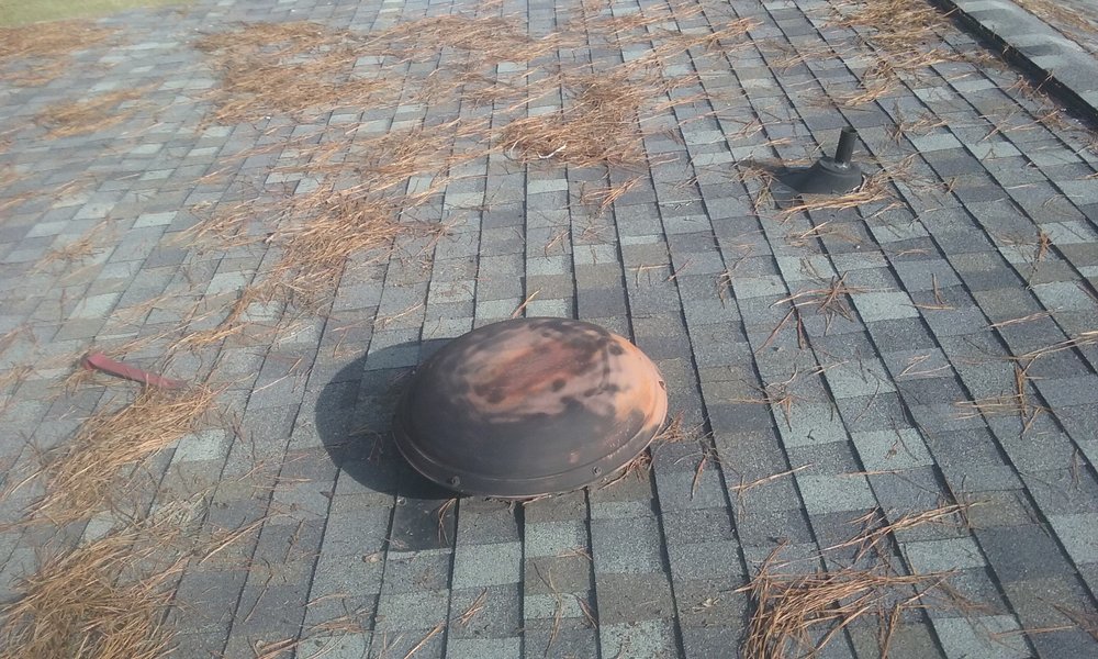 Slide of Masters Roofing