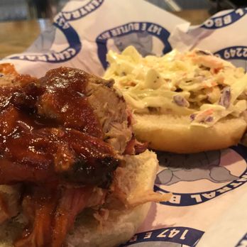Central BBQ - Pulled pork with a vinegar slaw and drizzled BBQ sauce. I suggest the mix of spicy and regular on anything you eat. - Barbeque Near Me - Memphis, Tennessee Central BBQ - Pulled pork with a vinegar slaw and drizzled BBQ sauce. I suggest the mix of spicy and regular on anything you eat. - Barbeque Near Me - Memphis, Tennessee