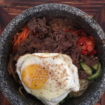 Burning Rice - Bulgogi on kimchi rice, all the sides, hot stone bowl - Korean Near Me - The Colony, Texas Burning Rice - Bulgogi on kimchi rice, all the sides, hot stone bowl - Korean Near Me - The Colony, Texas