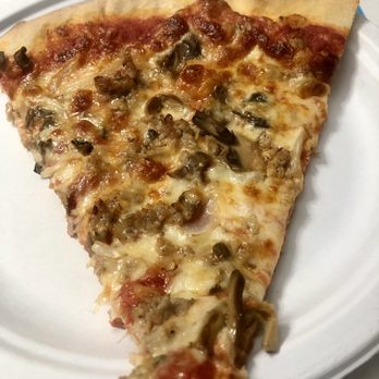 Kosta's Greek Eatery - Kostas sausage , mushroom & onion slice! A great pizza slice! - Greek Near Me - Pompano Beach, Florida