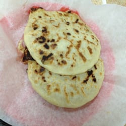 Pupuseria Y Restaurante Martinez - Two delicious pupusas rebueltas