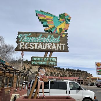 Thunderbird Restaurant - a woman standing in front of the sign - American Near Me - Mt. Carmel Junction, Utah
