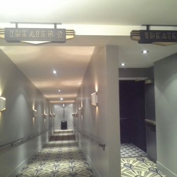 The Davis Theater - Hallway to theater 2(2 back auditoriums combined into 1 screen), & new carpeting & signage. - Cinema Near Me - Chicago, Illinois The Davis Theater - Hallway to theater 2(2 back auditoriums combined into 1 screen), & new carpeting & signage. - Cinema Near Me - Chicago, Illinois