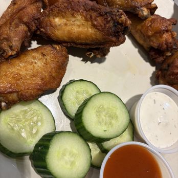 The Unusual Times - Pub wings with buffalo sauce and ranch - Pubs Near Me - Newark, New Jersey The Unusual Times - Pub wings with buffalo sauce and ranch - Pubs Near Me - Newark, New Jersey