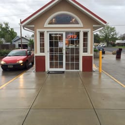 Front exterior view. Drive through on either side. Front exterior view. Drive through on either side.