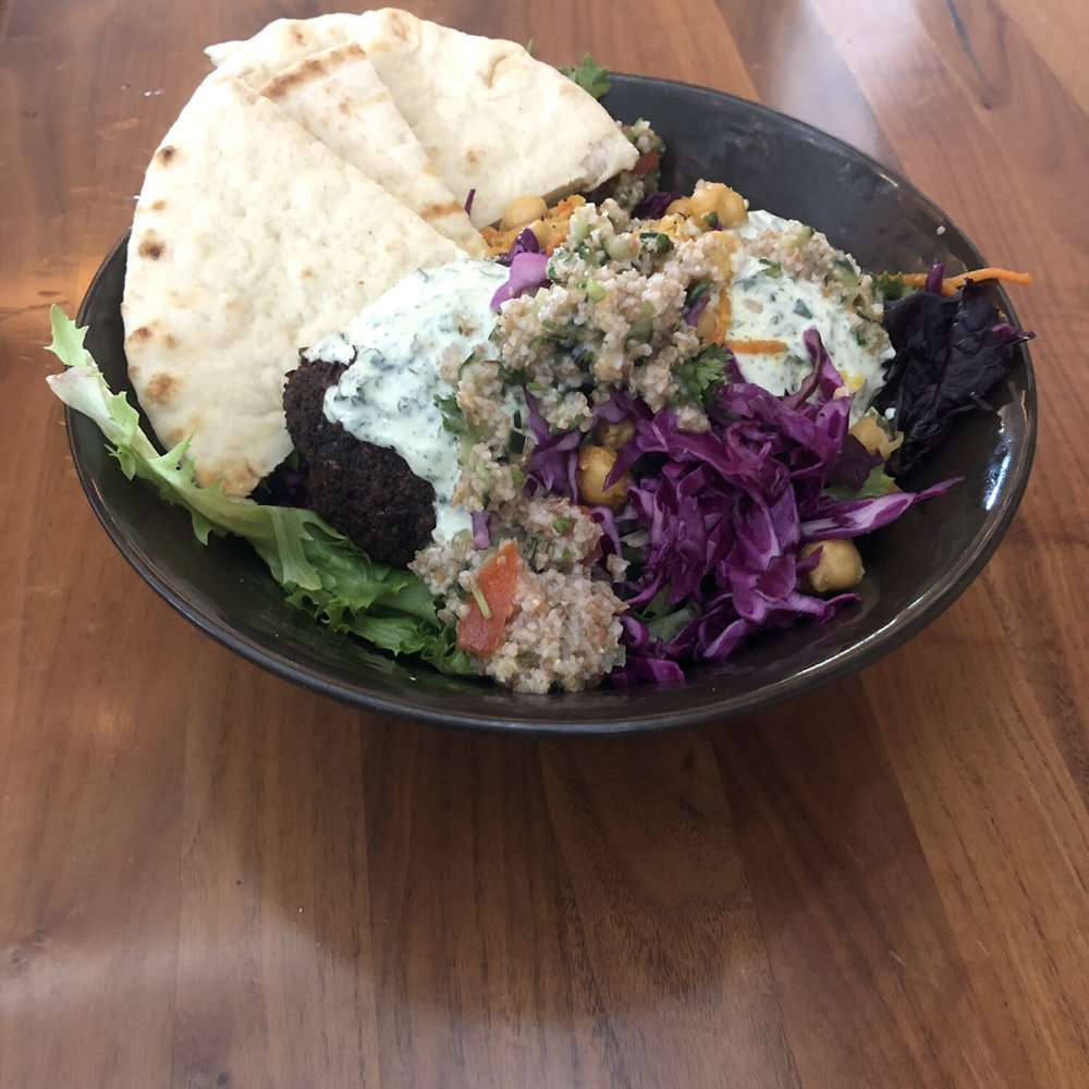 Falafel Salad with a side of Pita Bread from Amsterdam. Falafel Salad with a side of Pita Bread from Amsterdam.