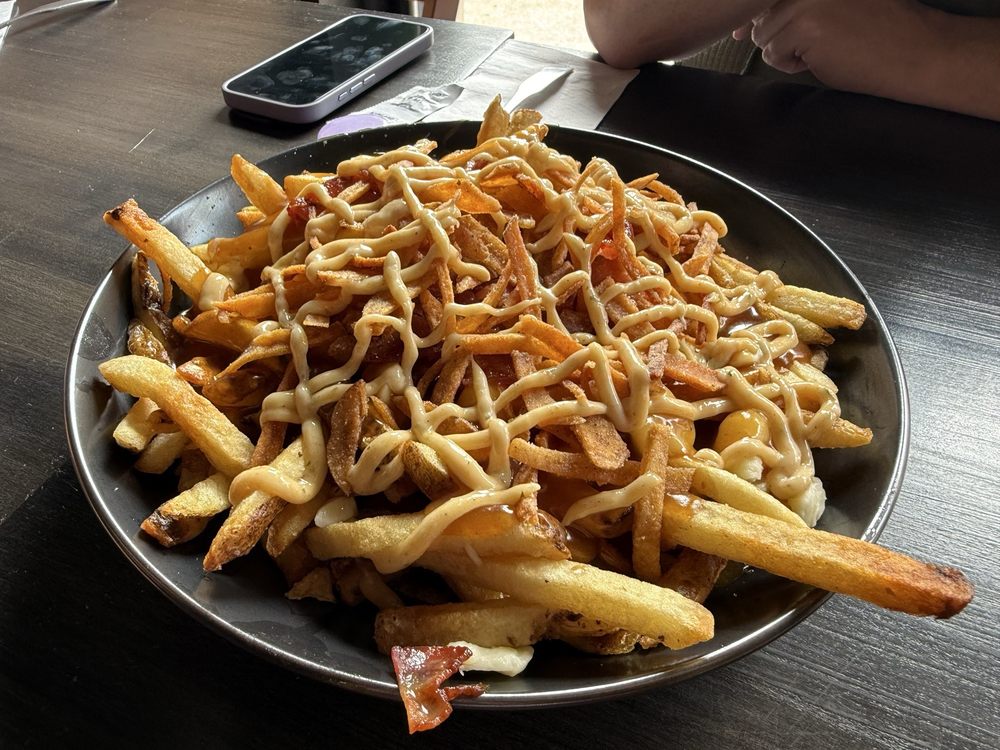 The Works Gourmet Burger Bistro Logo