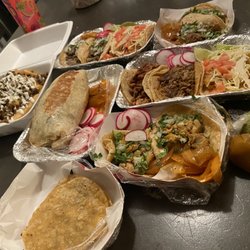 Carne asada fries, shrimp taco, carnitas taco, chicken taco, carne asada taco, Al pastor taco, carne asada mulita, California burrito
