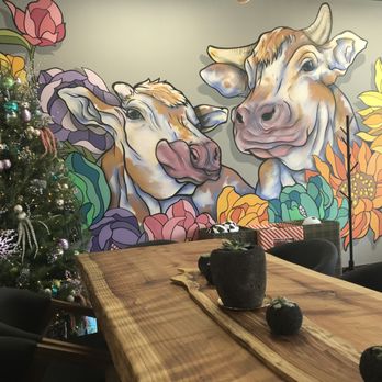 Pradera Brunch - Interior has live edge wood tables and fun artwork. - Breakfast & Brunch Near Me - Baldwin Park, California Pradera Brunch - Interior has live edge wood tables and fun artwork. - Breakfast & Brunch Near Me - Baldwin Park, California
