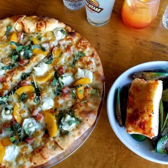 Hideaway House - Roast Peach & Caramelized Pancetta Pizza and some New Zealand Green Lipped Mussels in a garlic white wine sauce. - Pizza Near Me - Sedona, Arizona Hideaway House - Roast Peach & Caramelized Pancetta Pizza and some New Zealand Green Lipped Mussels in a garlic white wine sauce. - Pizza Near Me - Sedona, Arizona