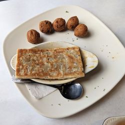 Half Shell Oyster House - Seafood pot pie with jalepeno hush puppies.