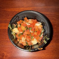 Really small container and not even filled to the top Bruschetta