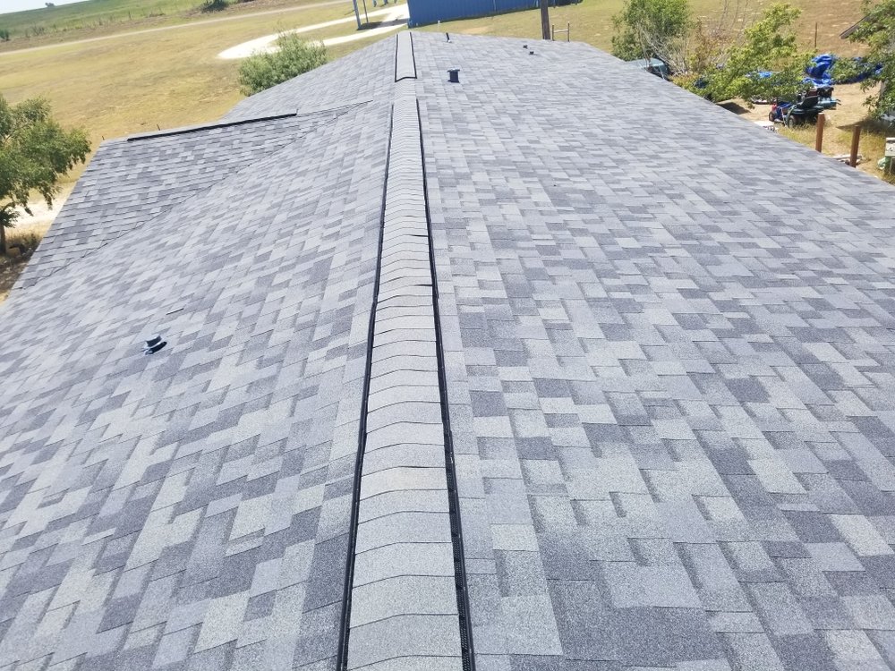 Slide of Monumental Roofing Services