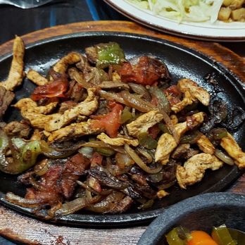 Cazadorez Mexican Restaurant - One of the three combination fajitas platters. - Mexican Near Me - Shawnee, Oklahoma Cazadorez Mexican Restaurant - One of the three combination fajitas platters. - Mexican Near Me - Shawnee, Oklahoma