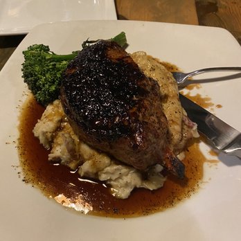 Broken Bit Steakhouse - Whiskey glazed porkchop - Steakhouses Near Me - Quartz Hill, California