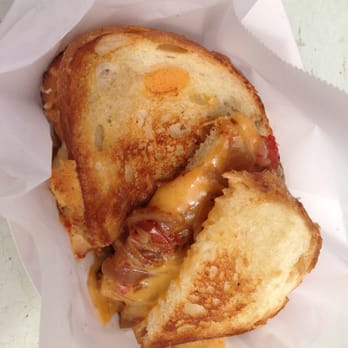 Devilicious - Lobster Grilled Cheese, with caramelized onions, tomatoes and jack and cheddar cheeses - New American Near Me Devilicious - Lobster Grilled Cheese, with caramelized onions, tomatoes and jack and cheddar cheeses - New American Near Me