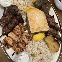 Zythos Platter: lamb chops, beef and chicken souvlaki, moussaka, rice, potatoes, kefthedes, tzatziki.