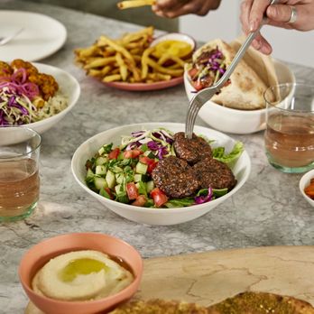 Taim - a table full of food - Mediterranean Near Me - Brooklyn, New York Taim - a table full of food - Mediterranean Near Me - Brooklyn, New York
