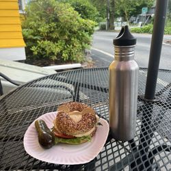 Bodacious Bagels - Sandwich on an everything ("bodacious") bagel, with hummus, lettuce, onion, tomato. Outdoor seating