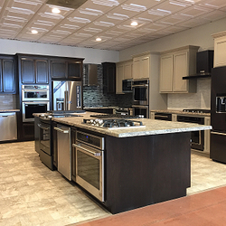 Center Appliance - New kitchen vignettes featuring KitchenAid, Maytag, Whirlpool and GE Appliances.