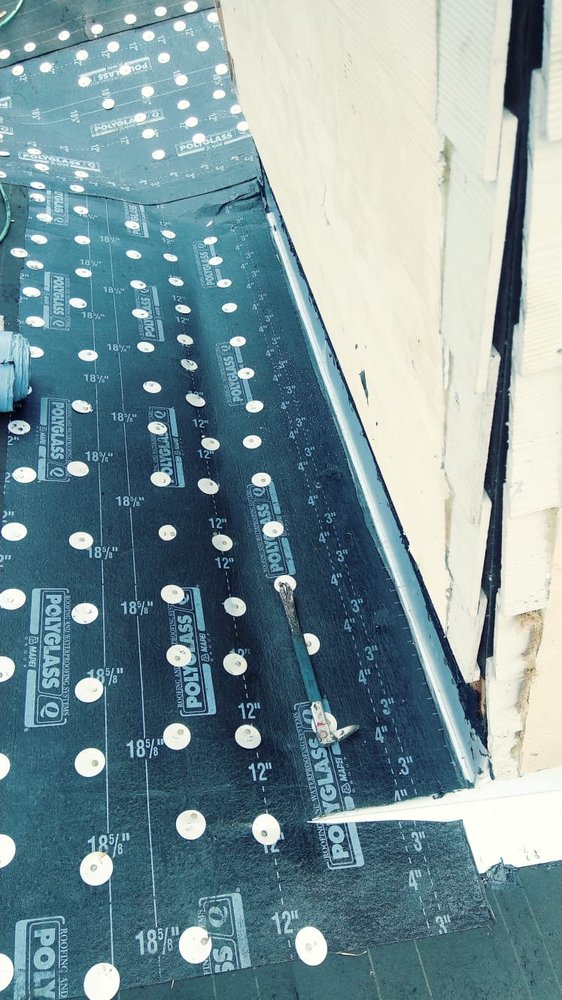 Slide of D-Tech Roofing