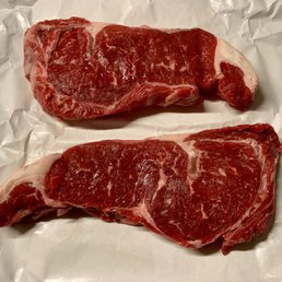 Their rib eyes ready to cook