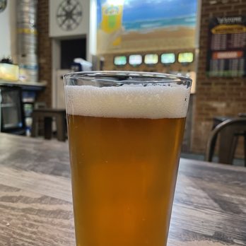Atlantic Pints - a pint of beer on a table - Beer Bar Near Me - Virginia Beach, Virginia