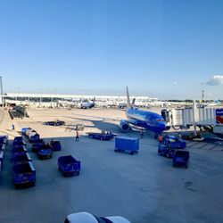Southwest Airlines - Lotta baggage carts sitting empty now that bags don't fly free.....