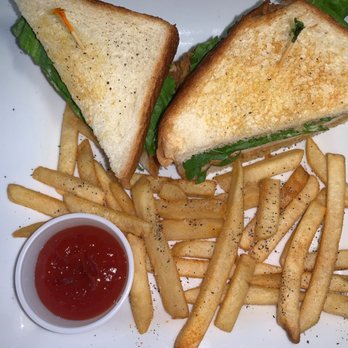 Moontower At The Oaks - a sandwich and french fries - American Near Me - Corsicana, Texas
