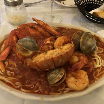 Maplewood Inn - The Uncle Nino entree. Lobster, clams, shrimp and Dungeness crab over homemade linguine in a spicy sauce. Absolutely delicious! - Italian Near Me - Hammonton, New Jersey