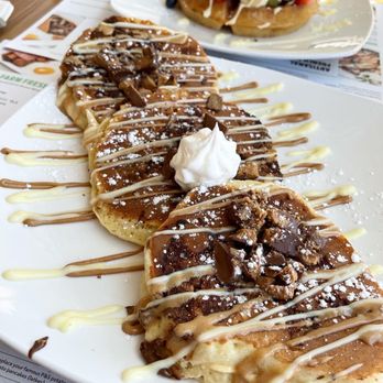 Pür & Simple - a plate of waffles on a table - Breakfast & Brunch Near Me - Port Coquitlam, British Columbia Pür & Simple - a plate of waffles on a table - Breakfast & Brunch Near Me - Port Coquitlam, British Columbia